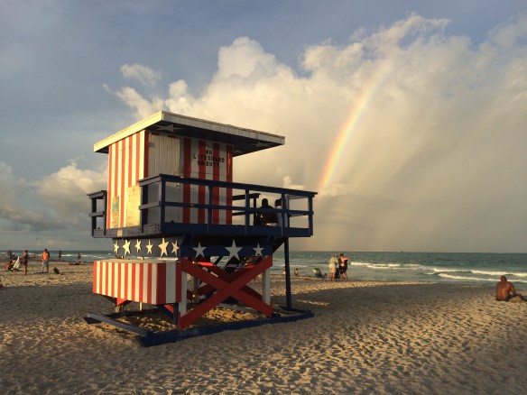Rainbow over the lifeguard huts on Miami beach